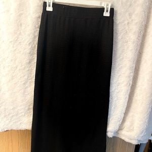 Black dress with slit on the side.